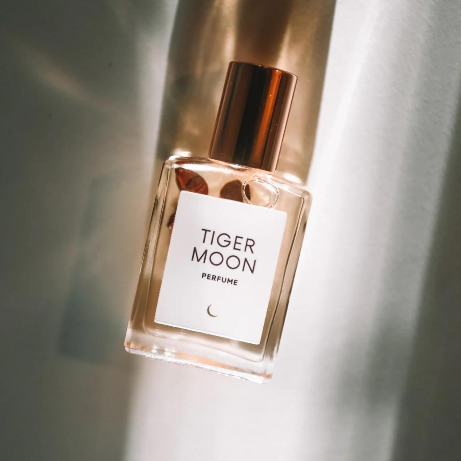 Olivine Atelier Tiger Moon perfume oil bottle front for long lasting fragrance.