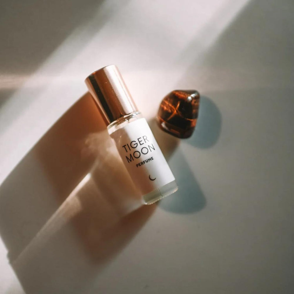Olivine Atelier Tiger Moon label details emphasize premium aromatherapy notes.