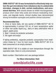 OMNi BiOTiC AB 10 bottle beside travel essentials for gut support.