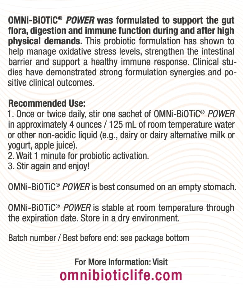 Glass of water with stirred OMNi-BiOTiC Power solution, illustrating quick reconstitution for gut support.