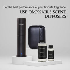Omxsair W Magic diffuser oil bottle in a softly lit room evoking luxury atmosphere.