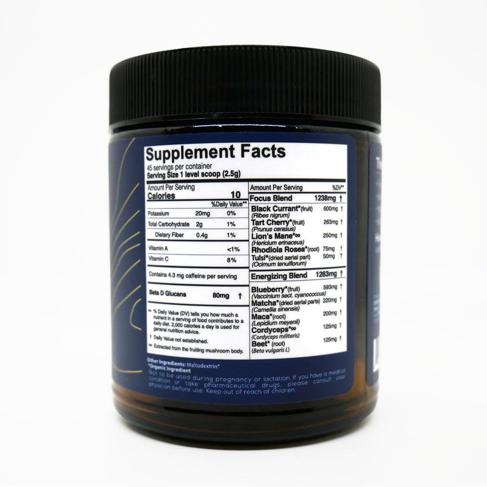 One Farm Energizing Focus glass jar close-up showing organic ingredients