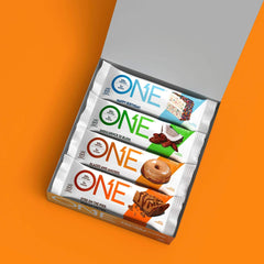 ONE Protein Bars packaging close-up highlighting gluten-free and 20g protein per bar.