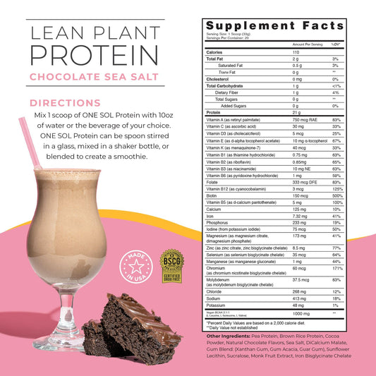 Close-up of One Sol Lean powder scoop beside glass of protein shake.