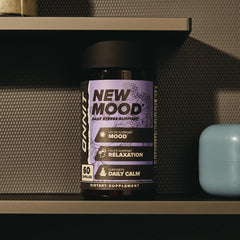ONNIT New Mood capsules close-up highlighting soft gel texture.