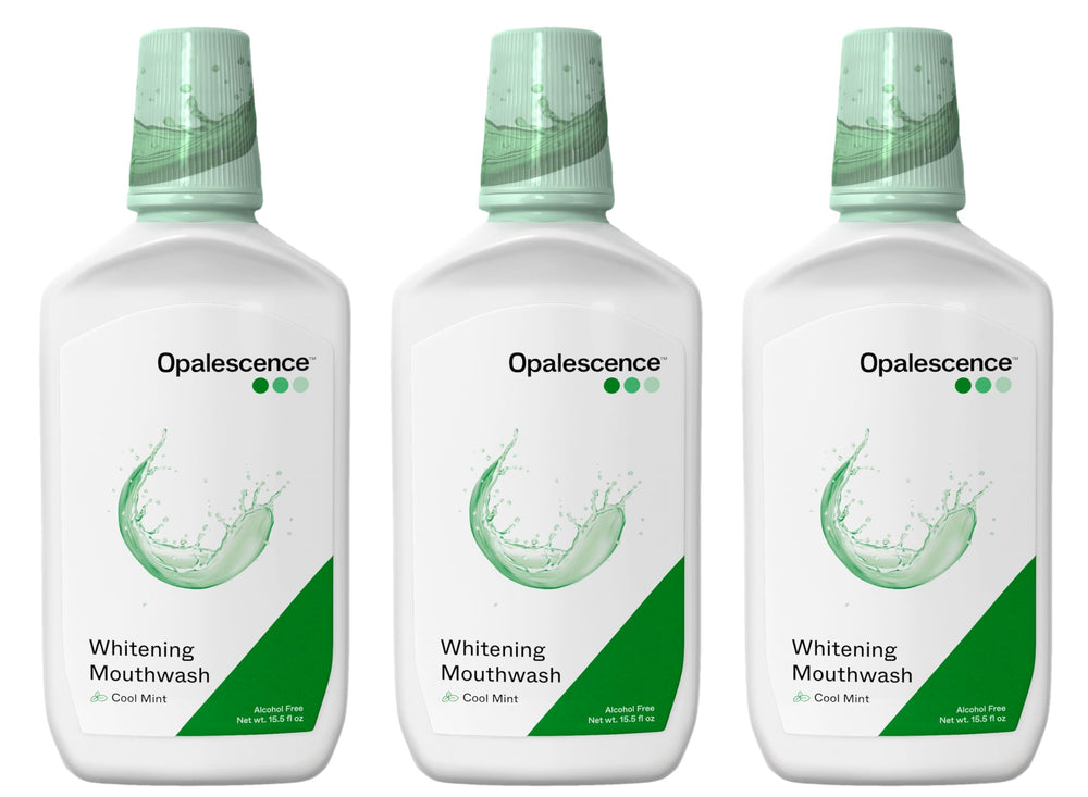 Opalescence whitening mouthwash bottle with cool mint label for daily whitening and fresh breath.
