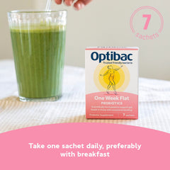 Morning routine with Optibac sachet beside glass before consumption.