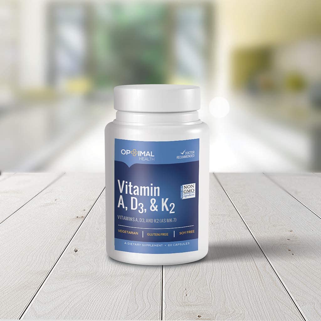 OPTIMALHEALTH Vitamin ADK daily-use bottle on table ready for everyday supplementation.