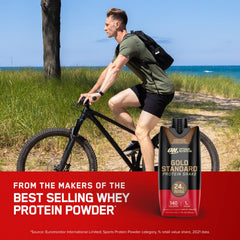 Glass and bottle of Gold Standard chocolate shake for a quick protein choice.