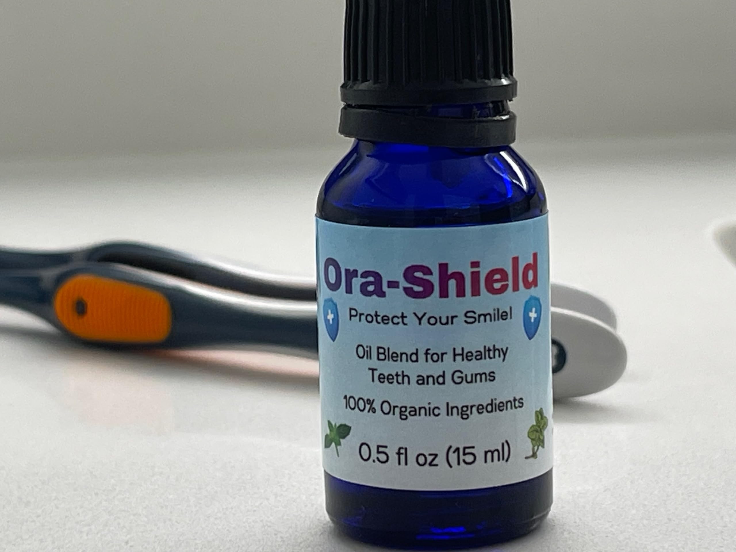 Ora-Shield oral irrigator use showing compatibility for deep gum pocket therapy.