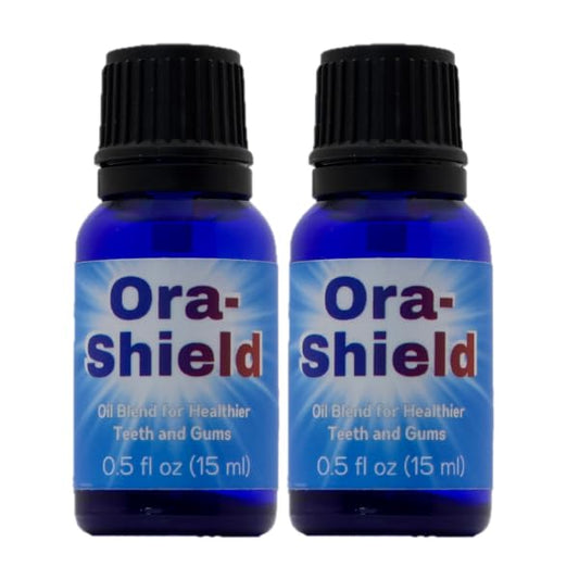 Ora-Shield tooth oil brush application for direct gum care and cleansing.