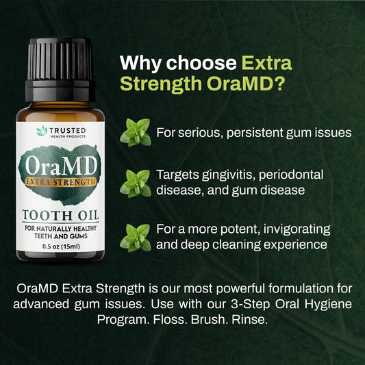OraMD 4-in-1 bottle beside a toothbrush supports daily cleaning.
