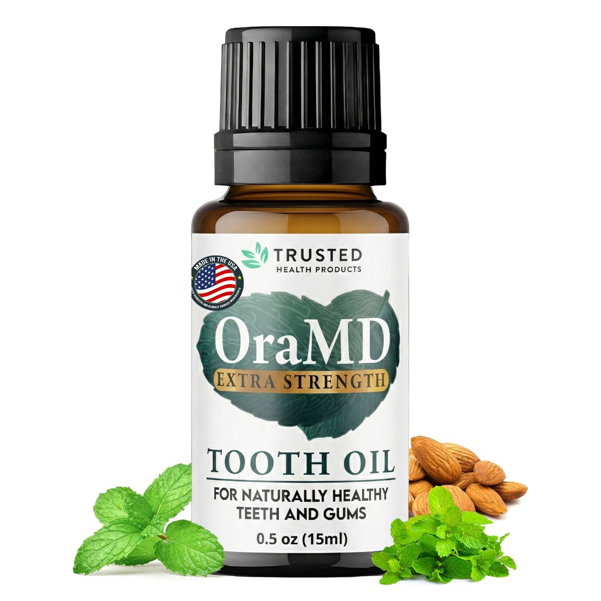 OraMD 4-in-1 tooth oil bottle on counter showing natural, multi-use care.