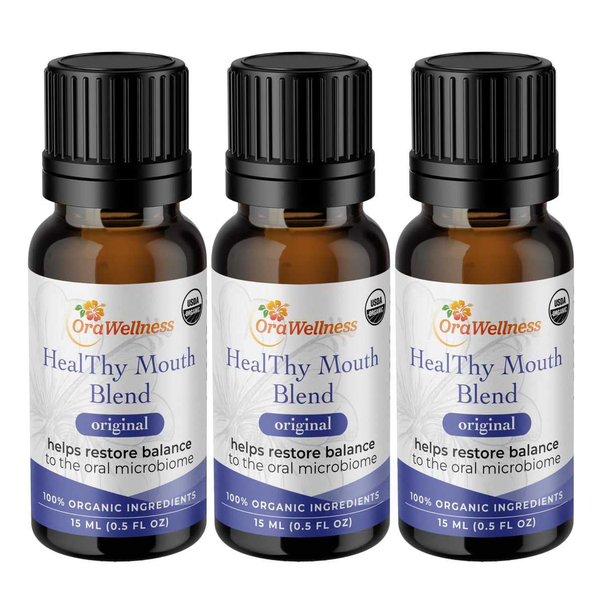 OraWellness Healthy Mouth Blend bottle pour for easy oil pulling and fresh breath.