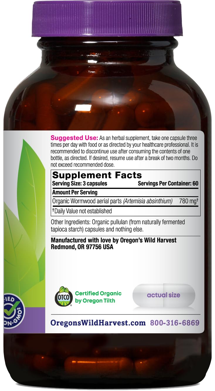 Closeup of wormwood capsules highlighting organic vegan formula for daily digestion