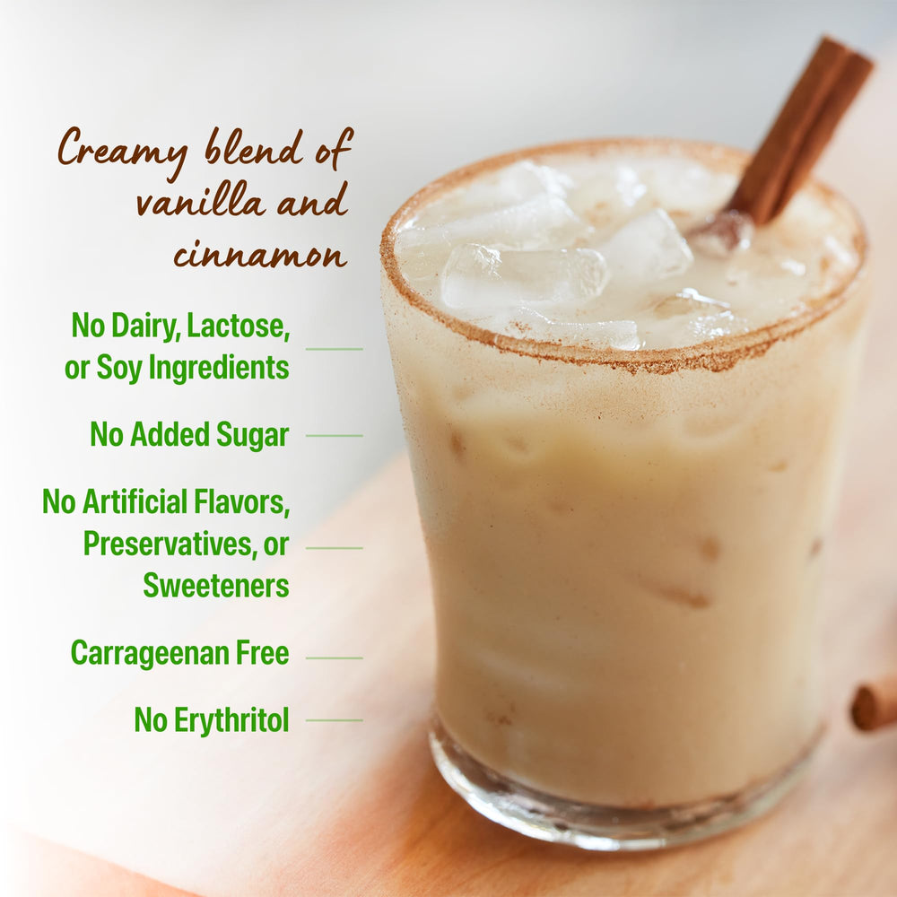 Pouring Orgain Horchata into oats for overnight protein boost.