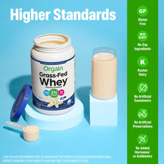 Orgain Vanilla Bean whey protein tub with glass of smoothie.