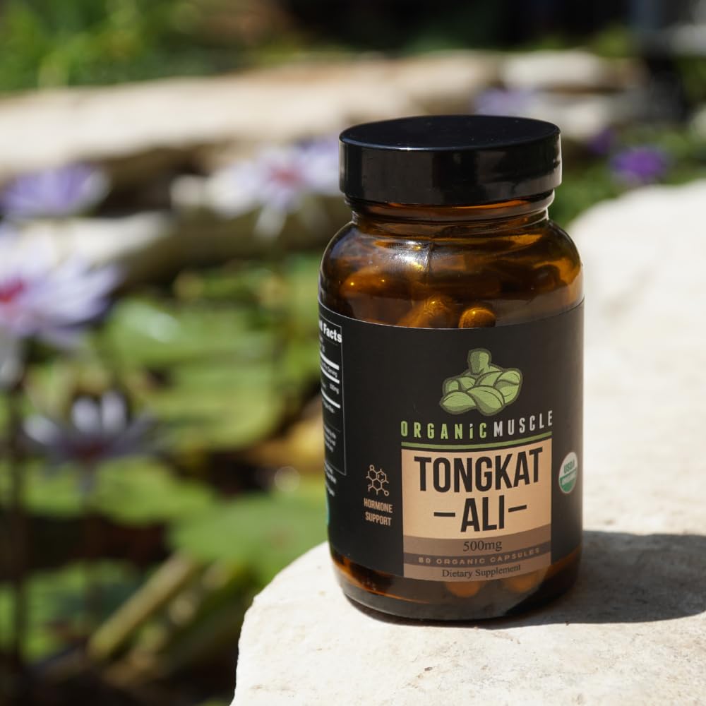 Organic Muscle Tongkat Ali beside water during a workout.