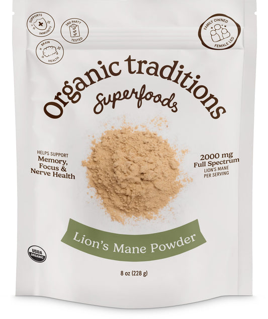 Organic Traditions Lion’s Mane Powder jar close-up highlighting clean, organic full-spectrum mushroom powder for daily cognitive nourishment.