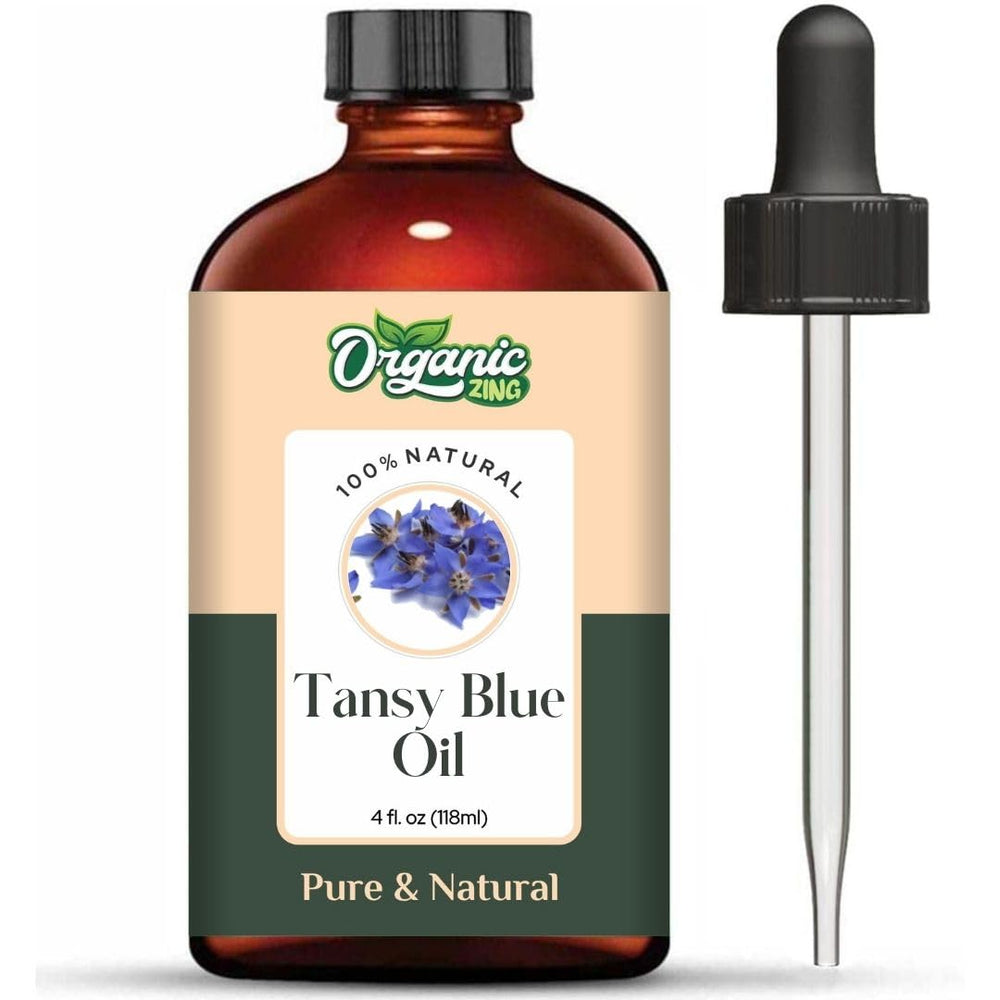 Organic Zing Tansy Blue Oil bottle closeup, ideal for skincare routines.