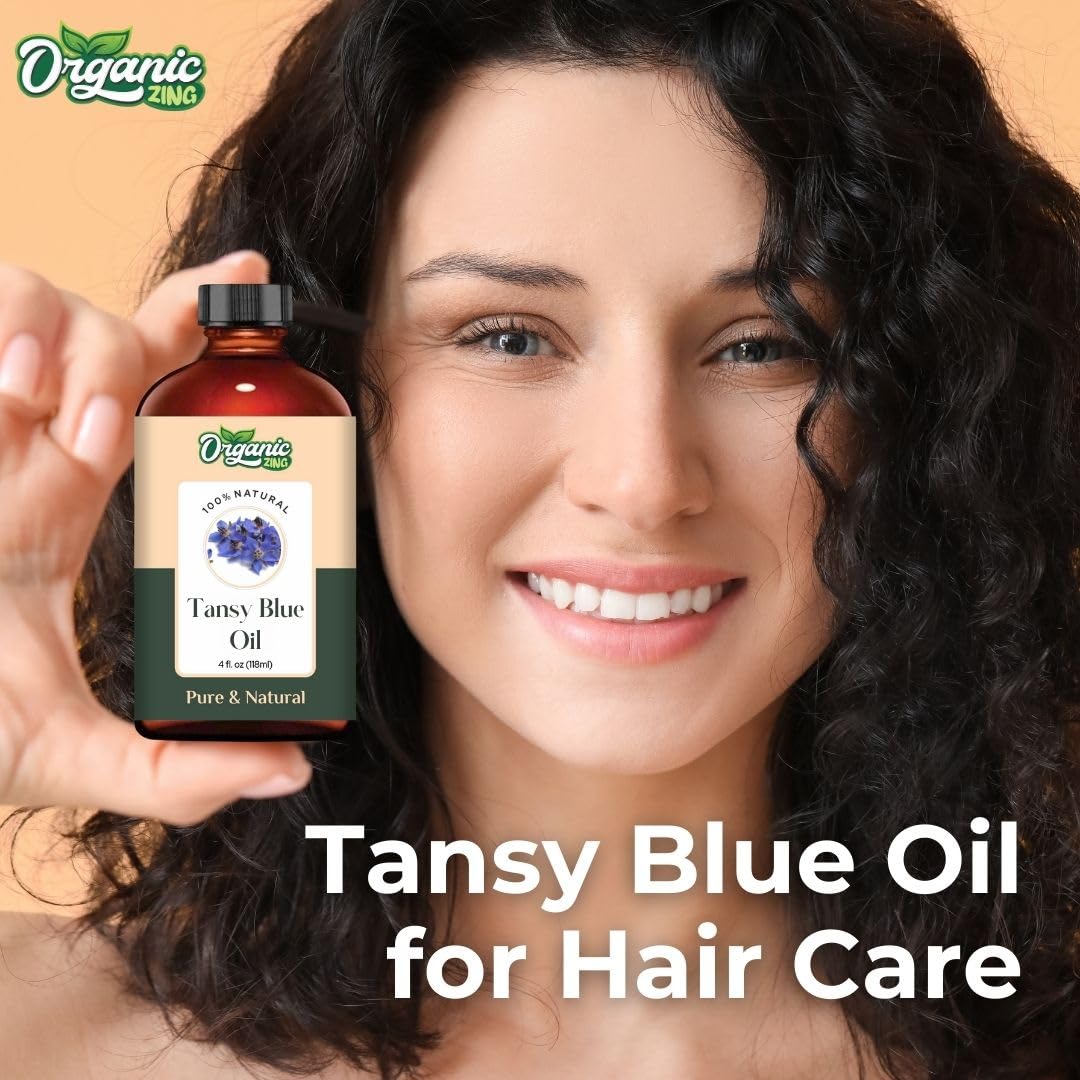 Organic Zing Tansy Blue Oil paired with carrier oils for versatile formulas.