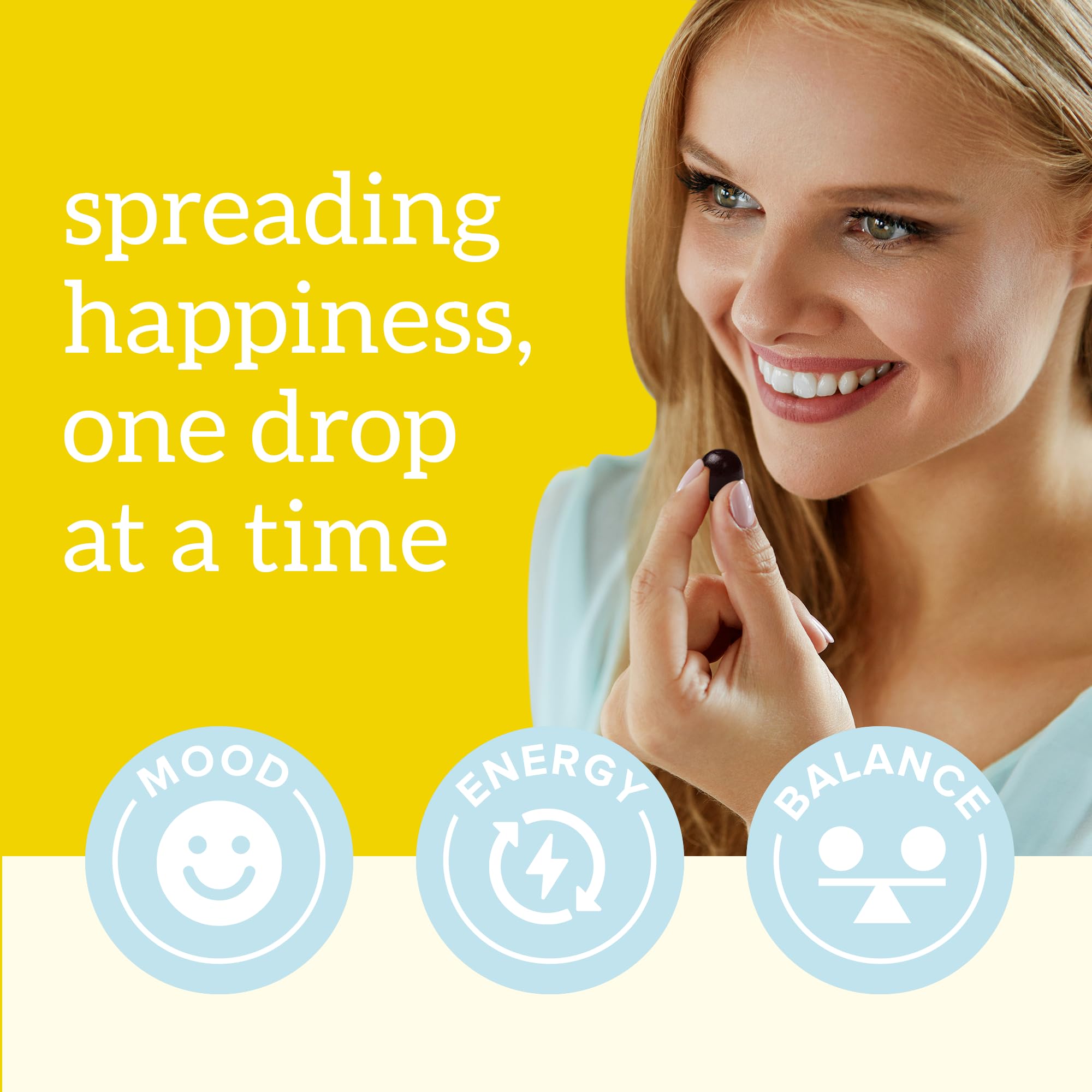 Organifi Happy Drops packaging shown beside a notebook for a mindful routine