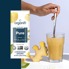 Organifi Pure Smart Packs on morning table implies easy daily routine.