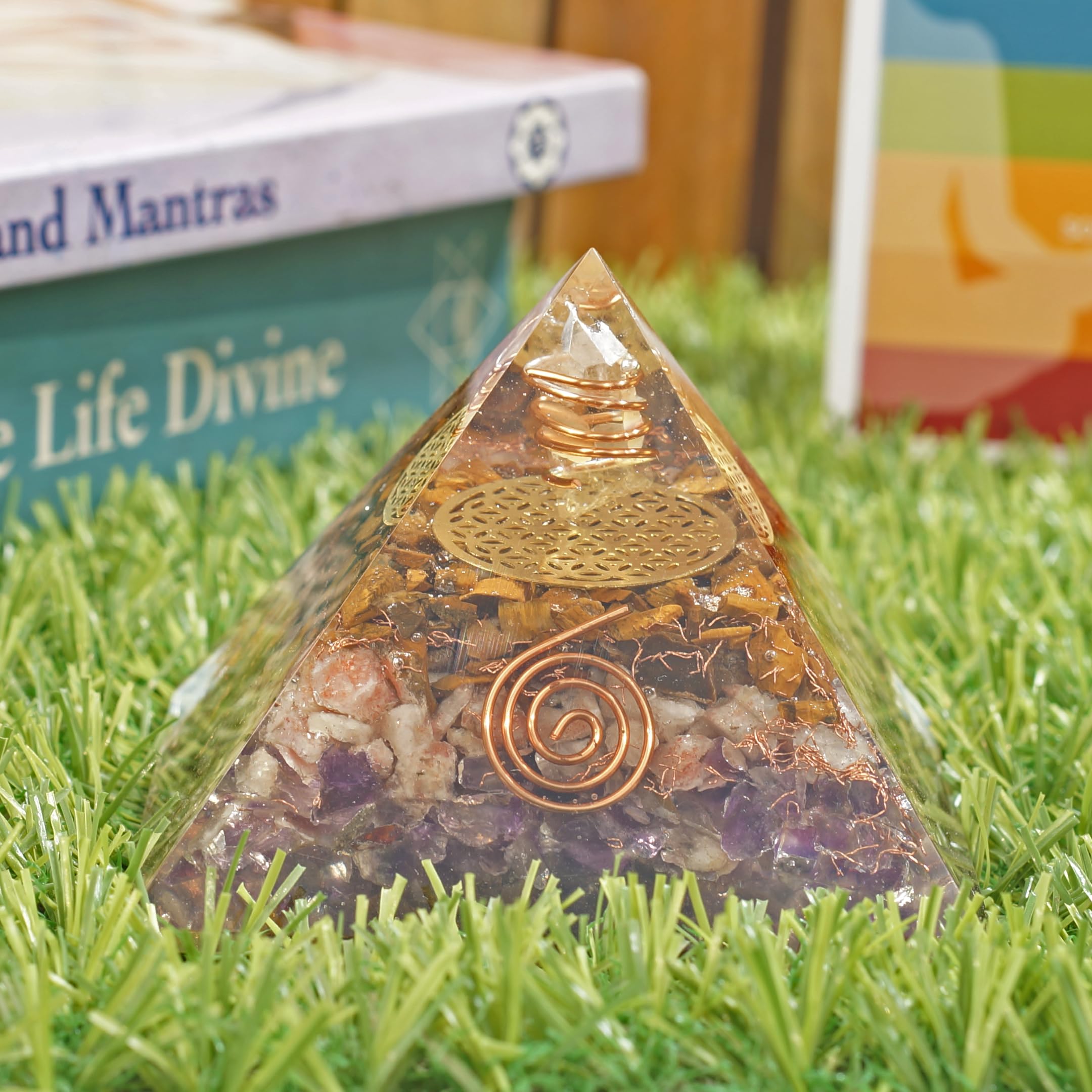 Sunstone detail on Orgonite Crystal Orgone Iron Will Pyramid highlighting radiant glow