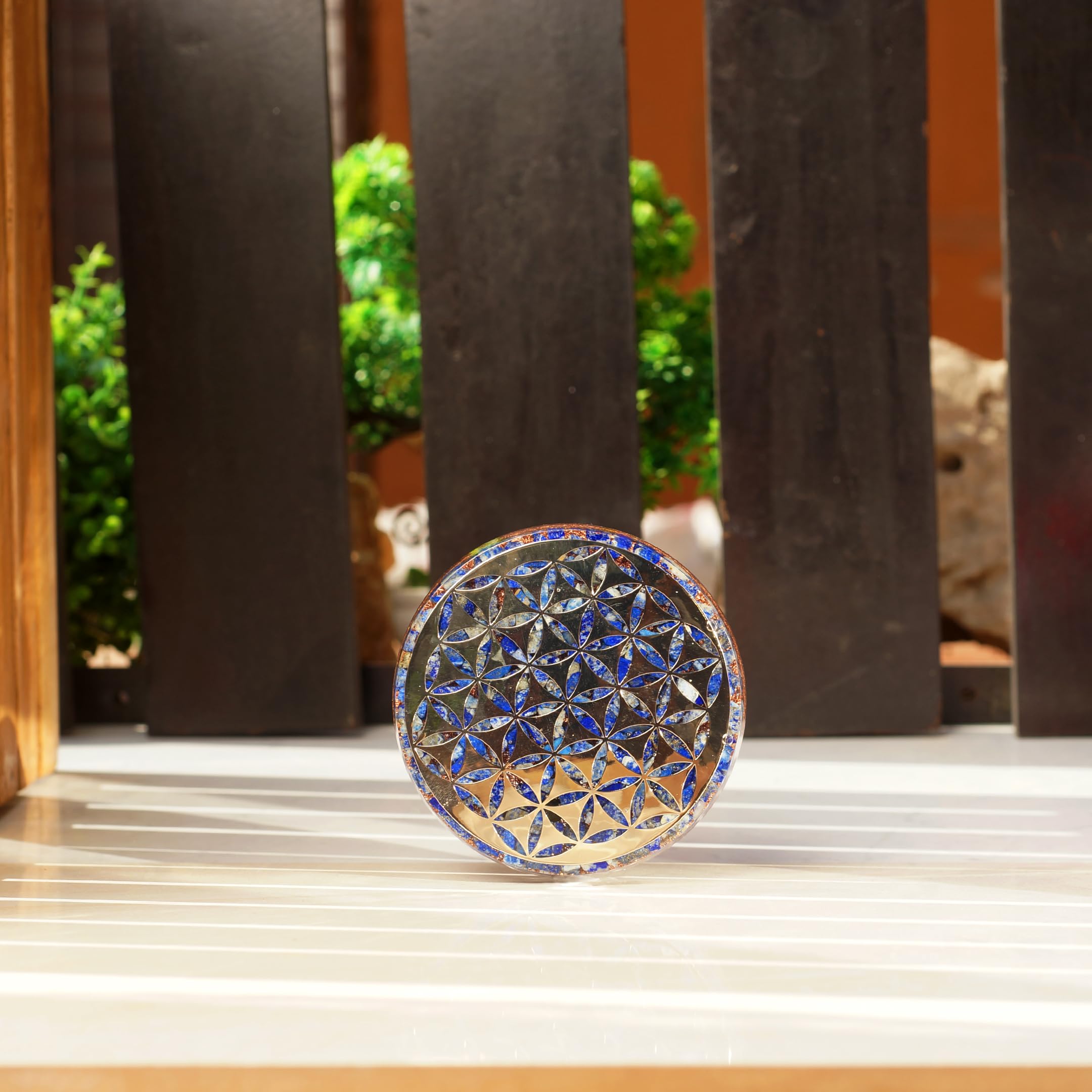 Orgonite Crystal water charging plate enhances third-eye focus with Lapis Lazuli.