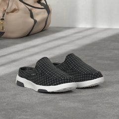 OrthoComfoot shoe side view highlighting lightweight, easy-on design for daily wear.