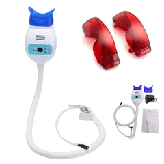 OUBO dental whitening lamp on table with adjustable head for easy sessions.