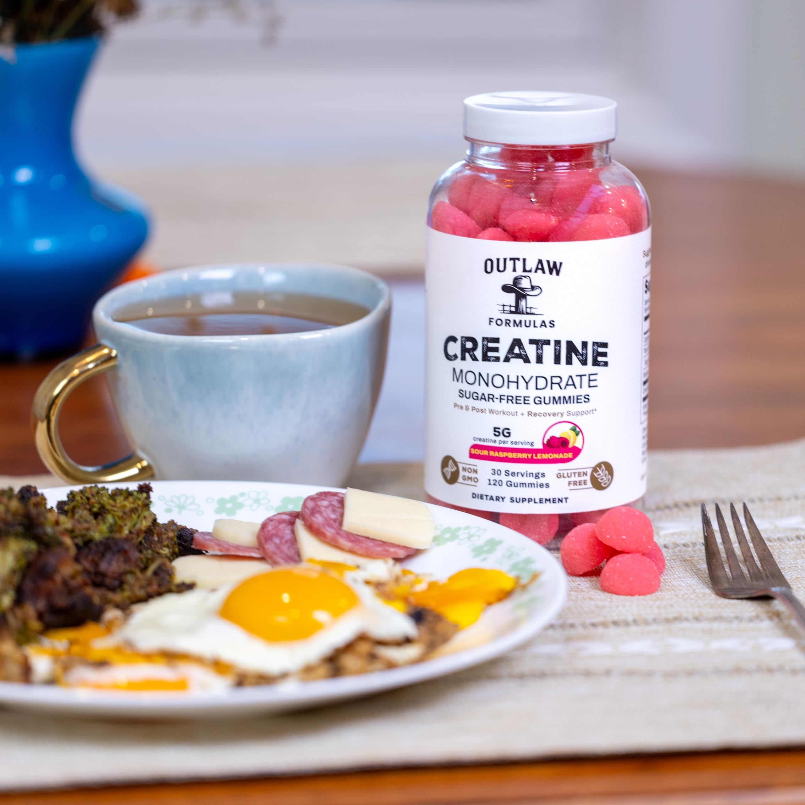 Outlaw Formulas Creatine Monohydrate Gummies pour closeup suggests quick pre/post workout fueling.