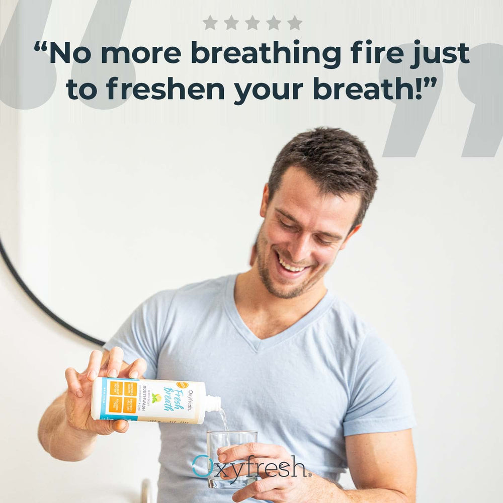 Oxyfresh Lemon Mint Mouthwash in a glass shows a gentle rinse.