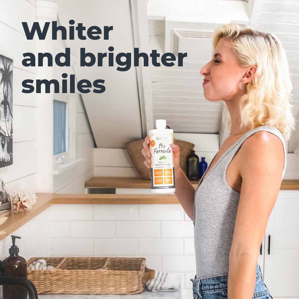 Oxyfresh Pro Formula mouthwash poured into a glass for freshness.