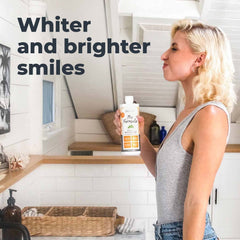 Oxyfresh Pro Formula mouthwash poured into a glass for freshness.