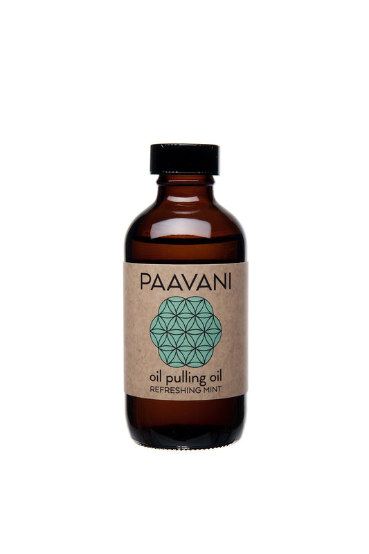 Paavani coconut mint pulling oil bottle promotes fresh breath.