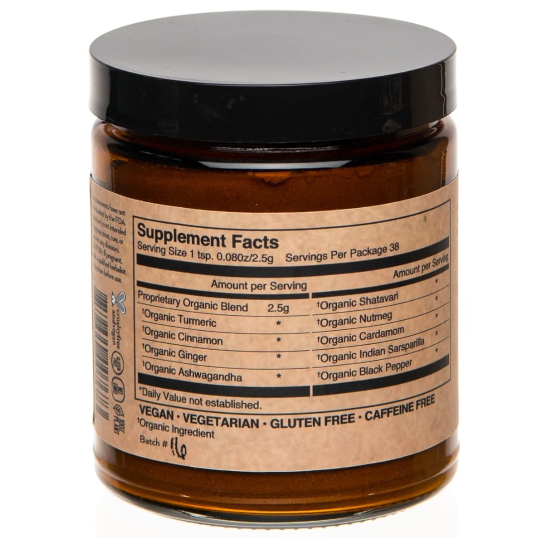 PAAVANI Golden Milk spoon measures turmeric blend for daily self-care.