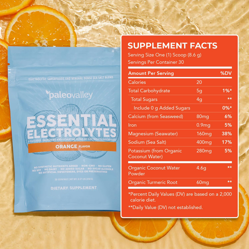Paleovalley Essential Electrolytes Orange lifestyle shot with active user.