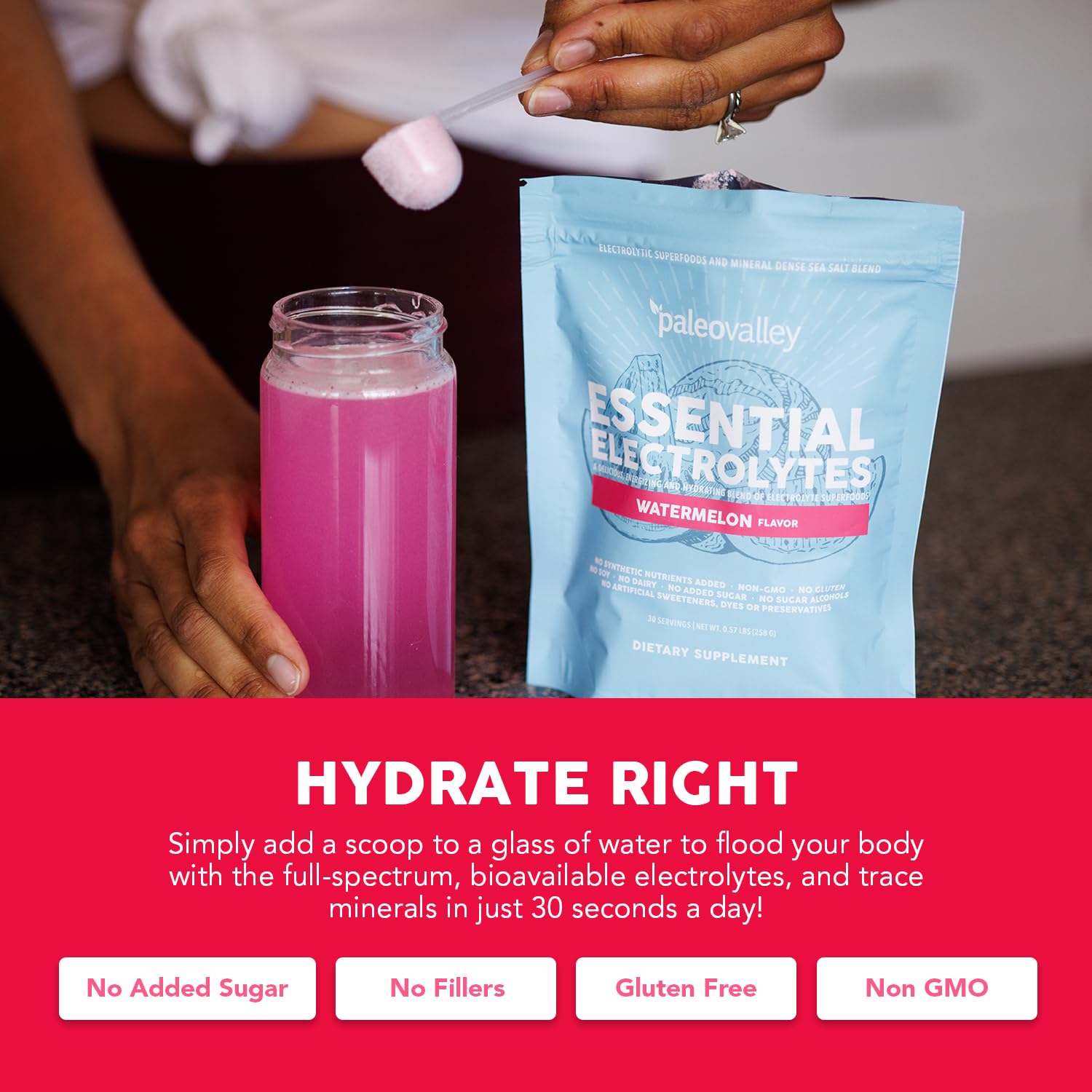 Paleovalley Essential Electrolytes powder in glass for refreshing hydration.