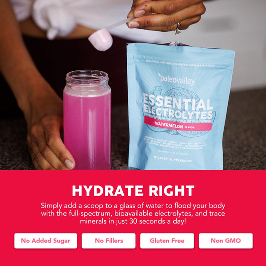 Paleovalley Essential Electrolytes powder in glass for refreshing hydration.