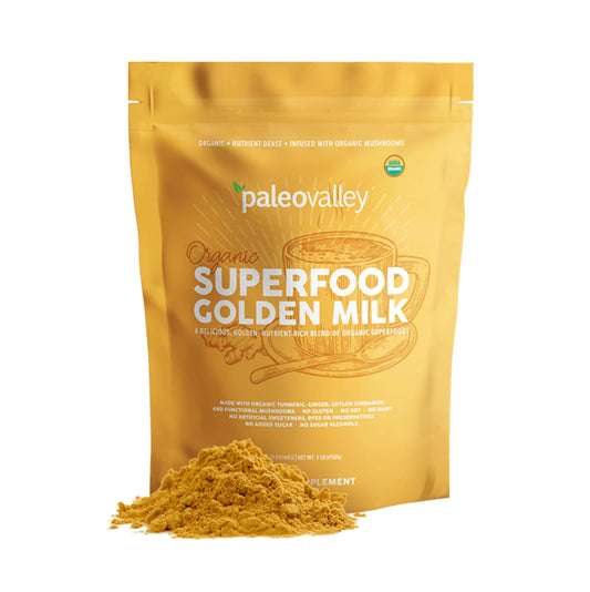 Paleovalley Golden Milk pour with turmeric and mushrooms promoting daily wellness.