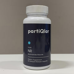 partiQlar NR capsules on white: easy daily intake option.