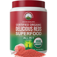 Peak Performance Organic Reds bottle pouring a vibrant juice for an energy lift