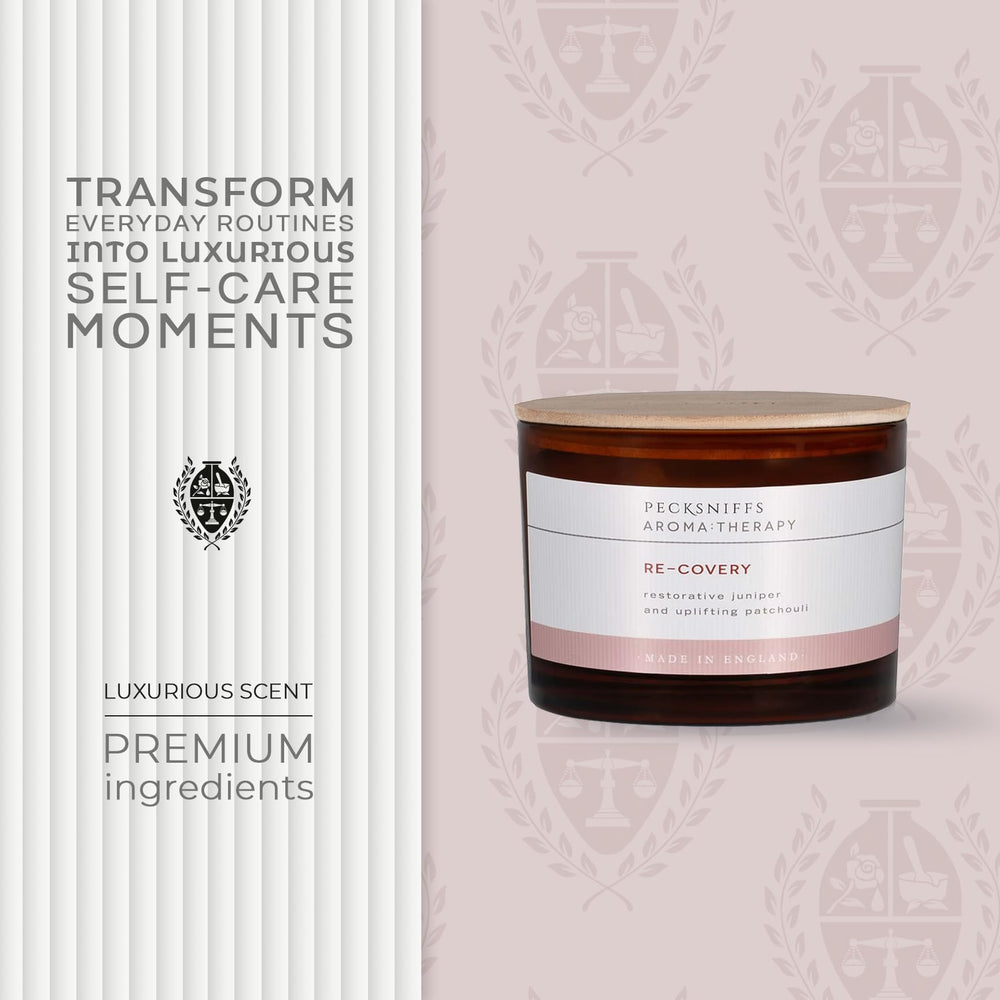 Close-up of Pecksniff's candle label showing juniper-patchouli and premium wax