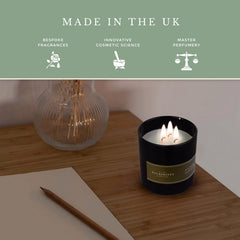 Pecksniff's candle in a room showcases warm ambience and mood-enhancing fragrance.