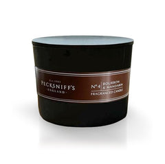 Pecksniff's Black Tall candle with three wicks for even burn and strong fragrance