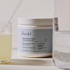 Perelel Hydration Support dissolved drink close-up showcases citrus sip.