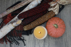 Peripeti Home pumpkin-ginger candle in a room scene for long-lasting fragrance up to 500 sq ft.