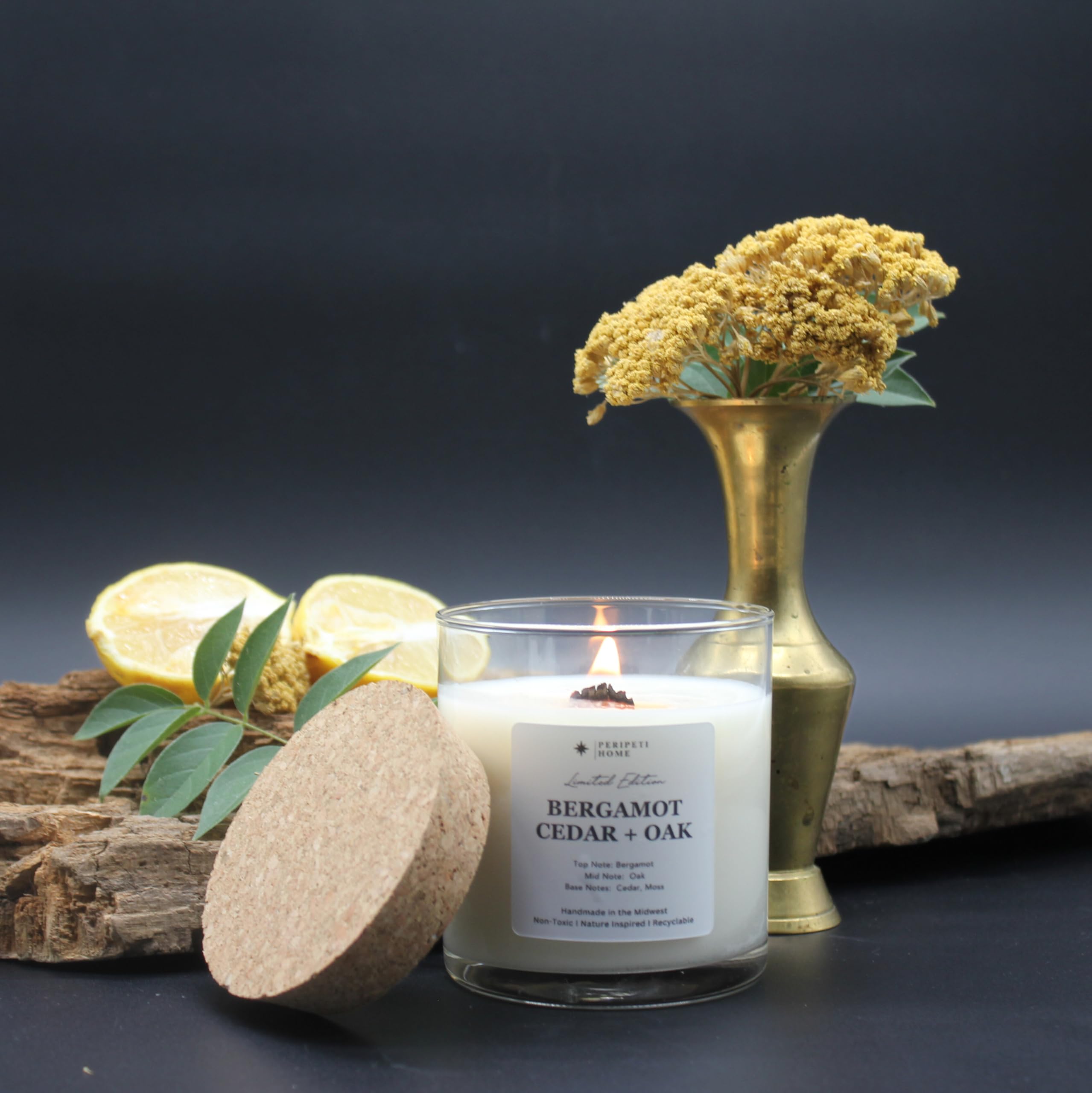 PeripetiHome clear vessel candle with cork lid for easy display.