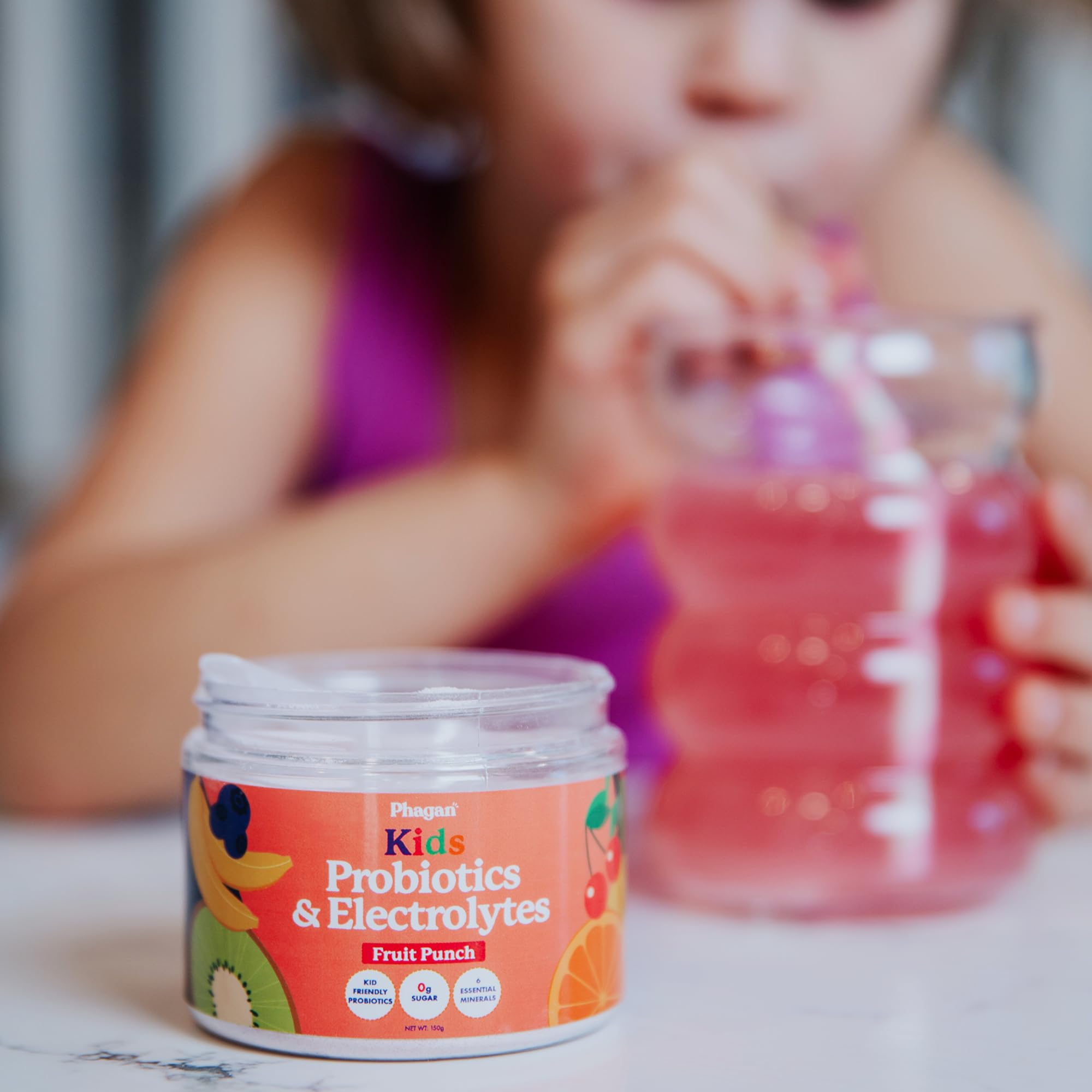 Phagan bottle close-up, zero sugar, plant-based formula supports daily hydration.